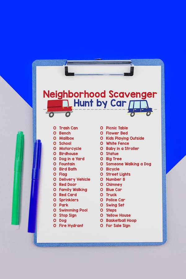 Scavenger Hunt by Car List on a clipboard and blue background