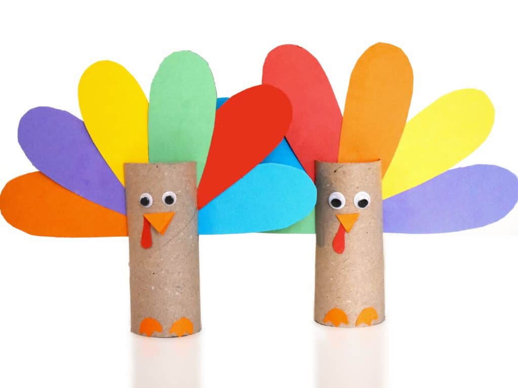 Two Toilet Paper Roll Turkey Craft Standing Next to Each Other