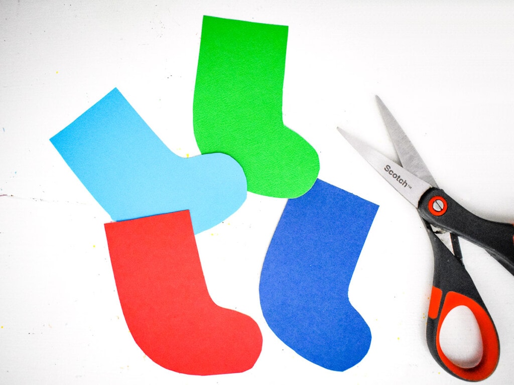Christmas Stockings cut out of different colored paper