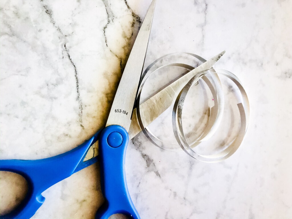 Scissors with silver curling ribbon