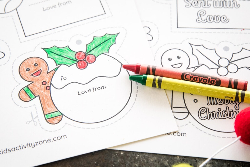 Printable Christmas Gift Tags with crayons by it