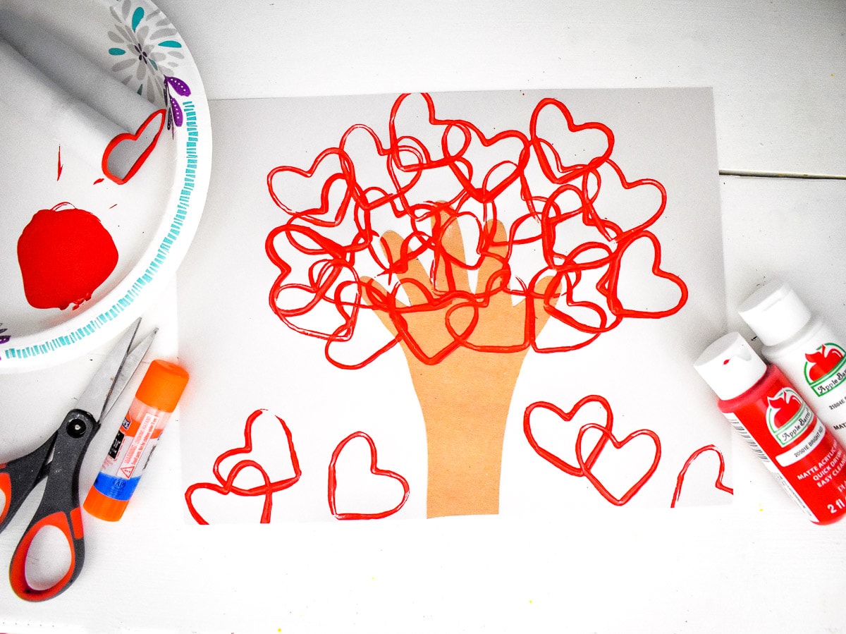 Heart Tree Valentine's Day Craft with supplies around it