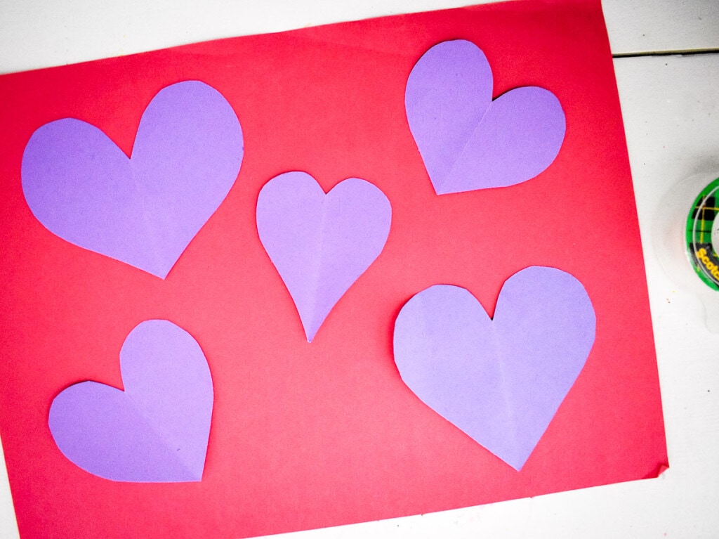 Purple heart on a red piece of paper