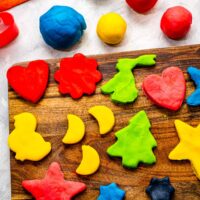 Playdough cut outs on cutting board