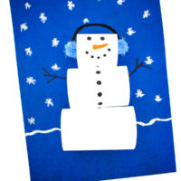 Paper Loop Snowman on blue background with snowflakes on paper