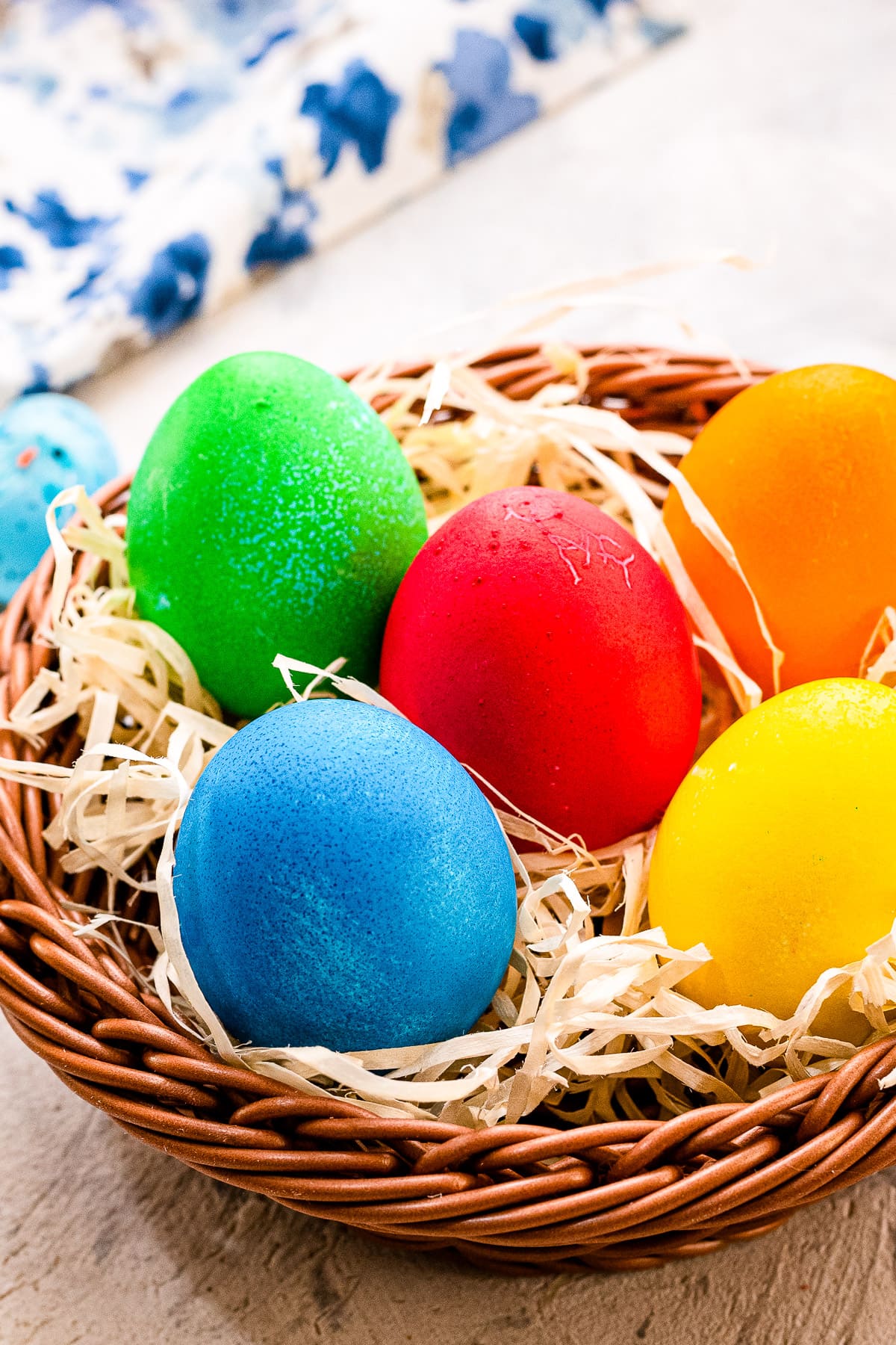 Brown Basket with Easter Eggs that are dyed