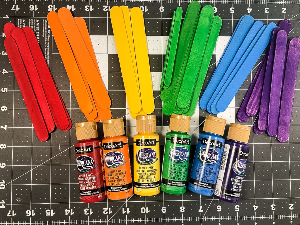 Painted popsicle sticks in rainbow colors