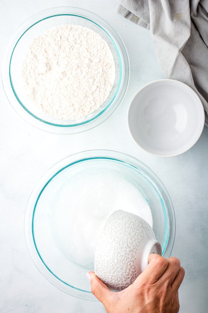 Adding salt to glass bowl for salt dough