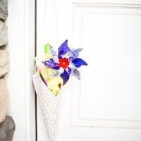 White door with May Day Basket hanging on it