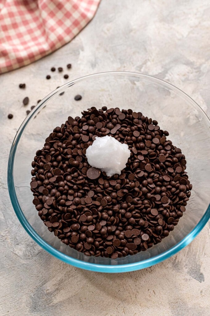 Glass bowl with coconut oil and chocolate chips