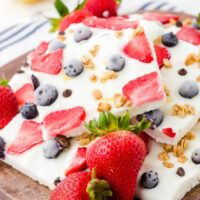 Yogurt Bark with fruit on wooden platter