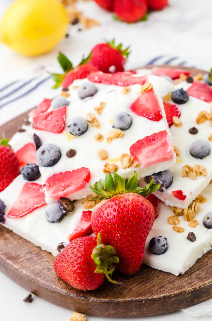 Yogurt Bark with fruit on wooden platter