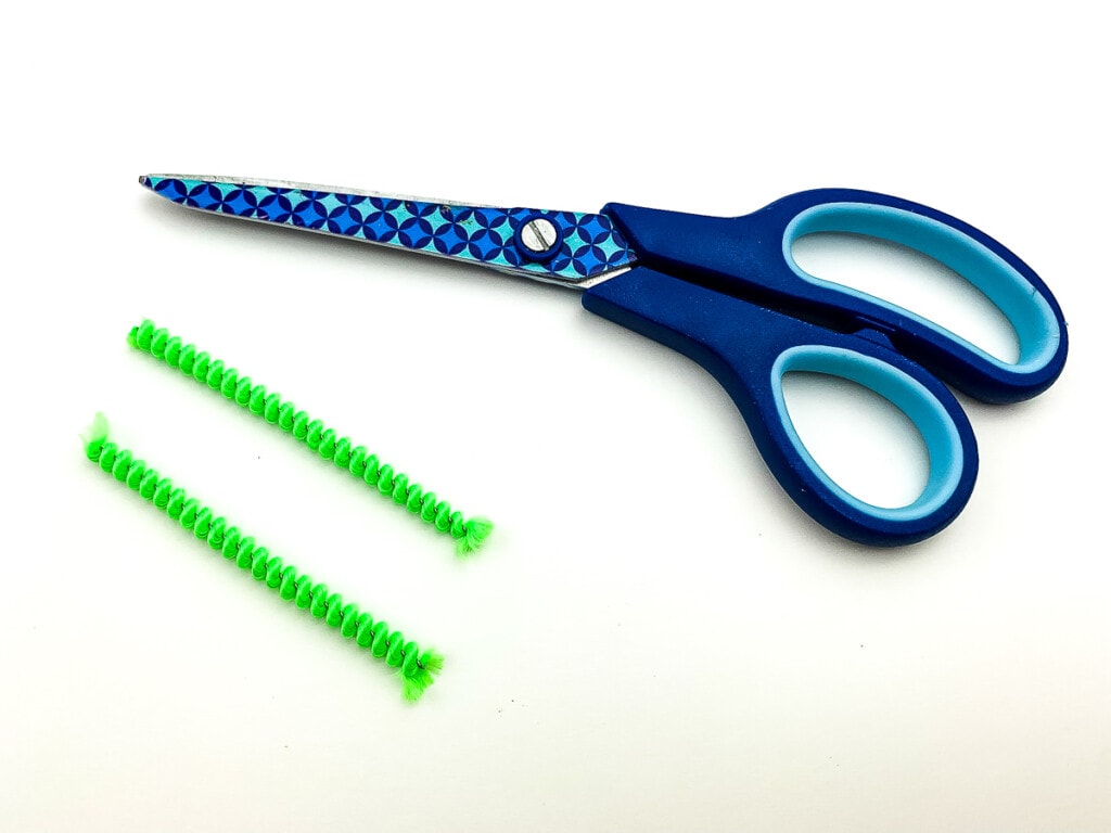 Green pipe cleaners with scissors