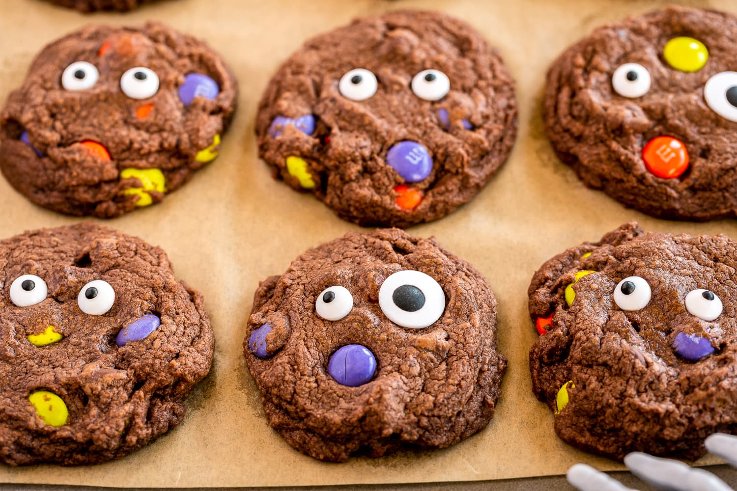 Halloween Monster Cookies on parchment paper