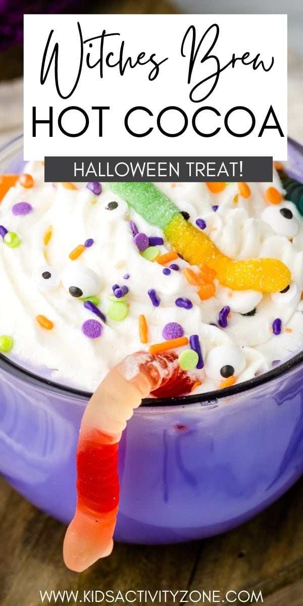 Delicious homemade hot chocolate recipe that is turned into a festive Halloween drink! This Witches Brew Hot Chocolate is colored purple and topped with whipped cream, gummy worms, candy eyes and sprinkles for a creepy, fun beverage the kids will love!