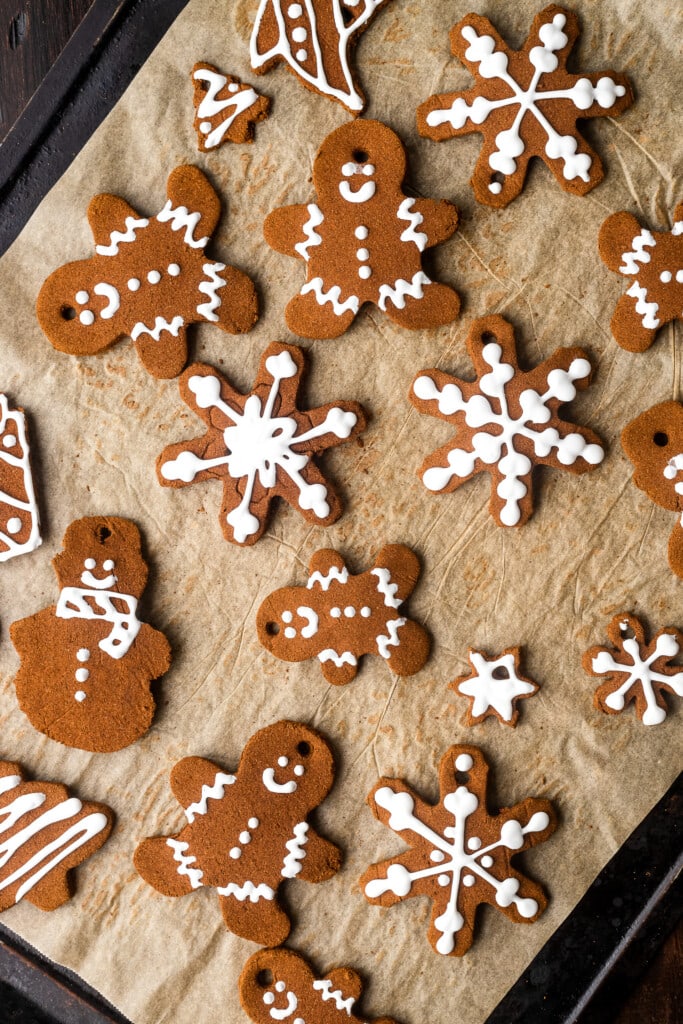 Parchment paper with decorated cinnamon ornaments