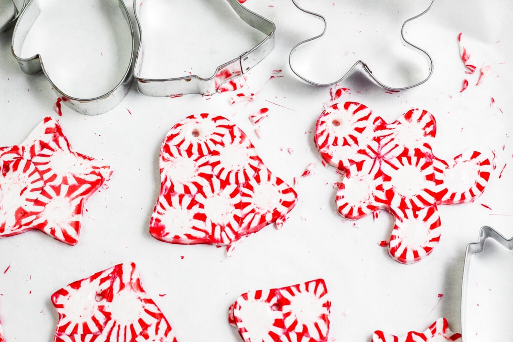 Melted Peppermint ornaments on light background