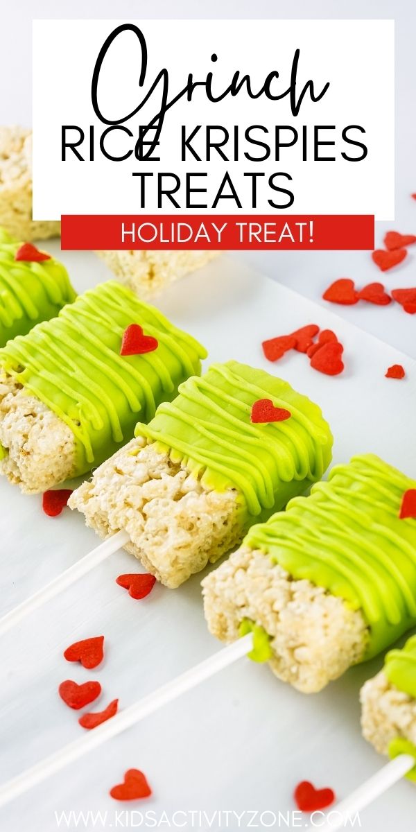 Rice Krispies Treats that are dipped in green candy melts and decorated with a red heart! These Grinch Rice Krispies Treats are the perfect treat for a holiday or Grinch themed party.