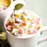White mug with white chocolate and marshmallows