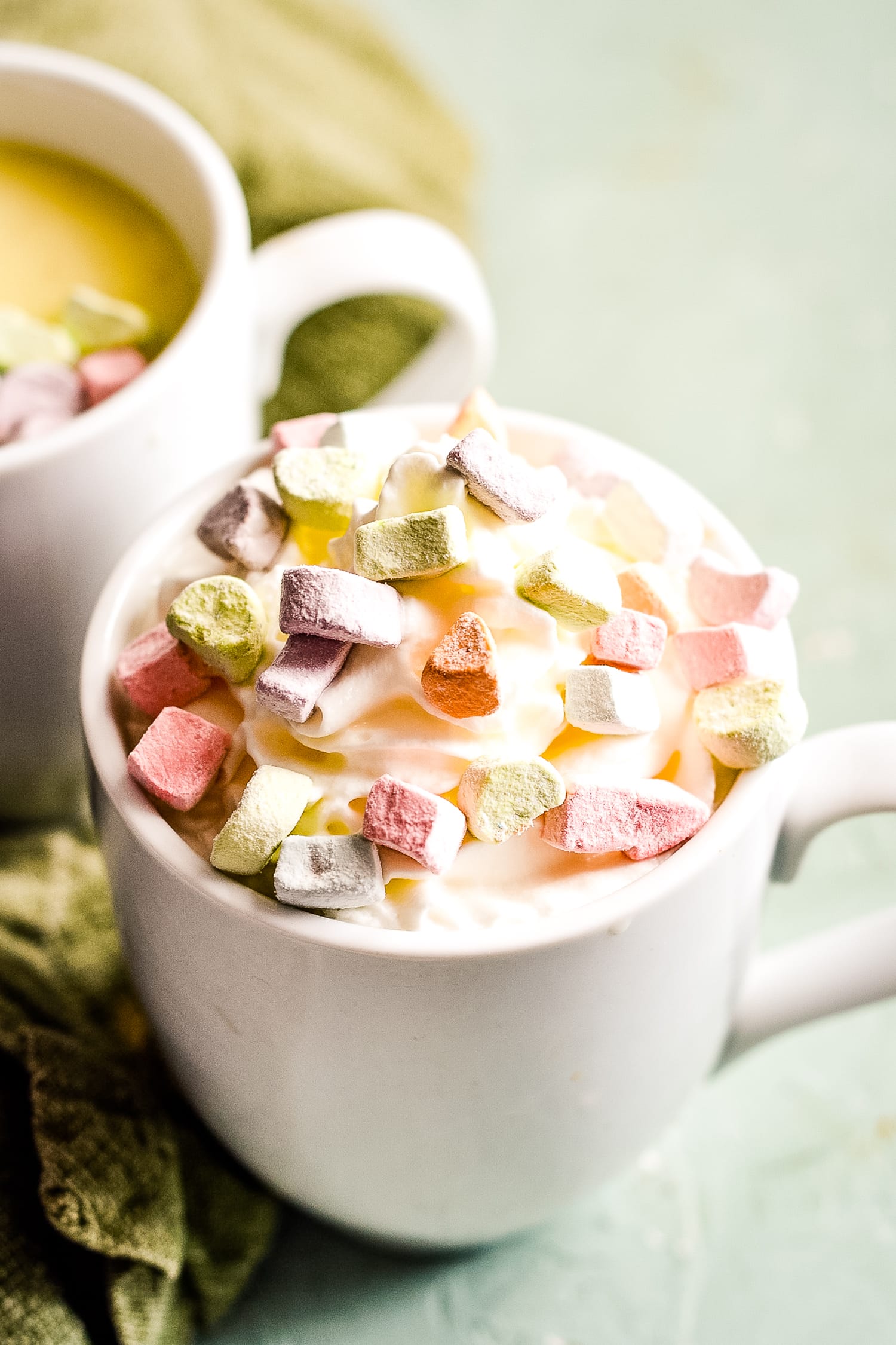 White mug with white chocolate and marshmallows