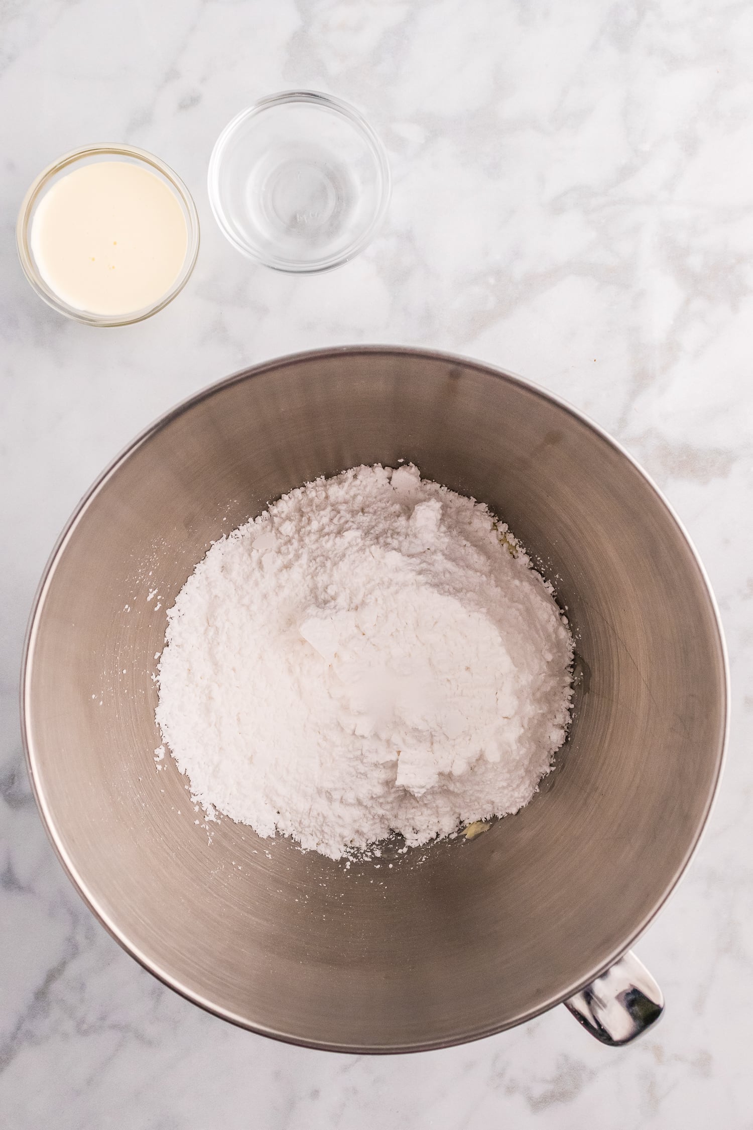 Powdered sugar in mixing bowl