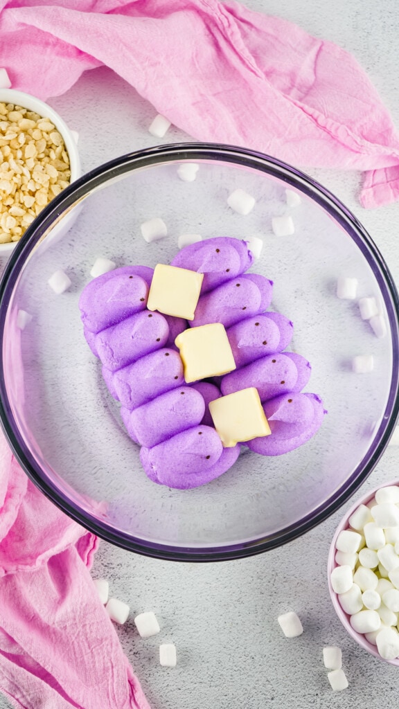 Mixing bowl with purple peeps and butter slabs