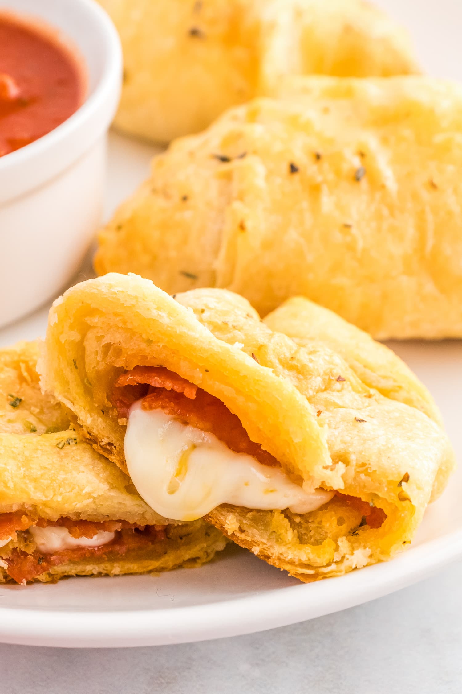 Pizza Crescent Rolls torn open on plate