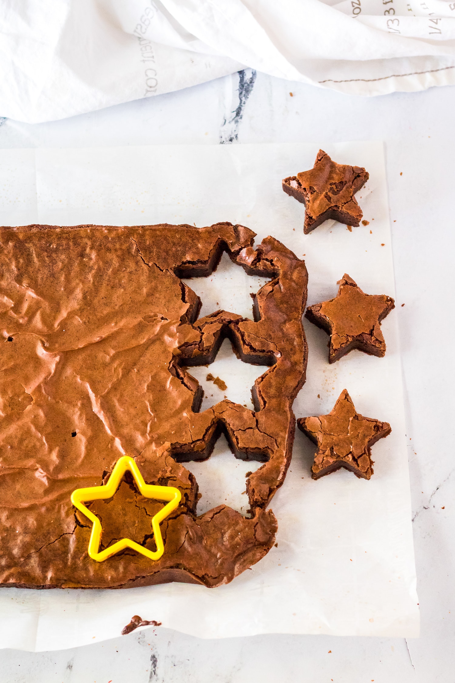 Cutting stars out of brownies