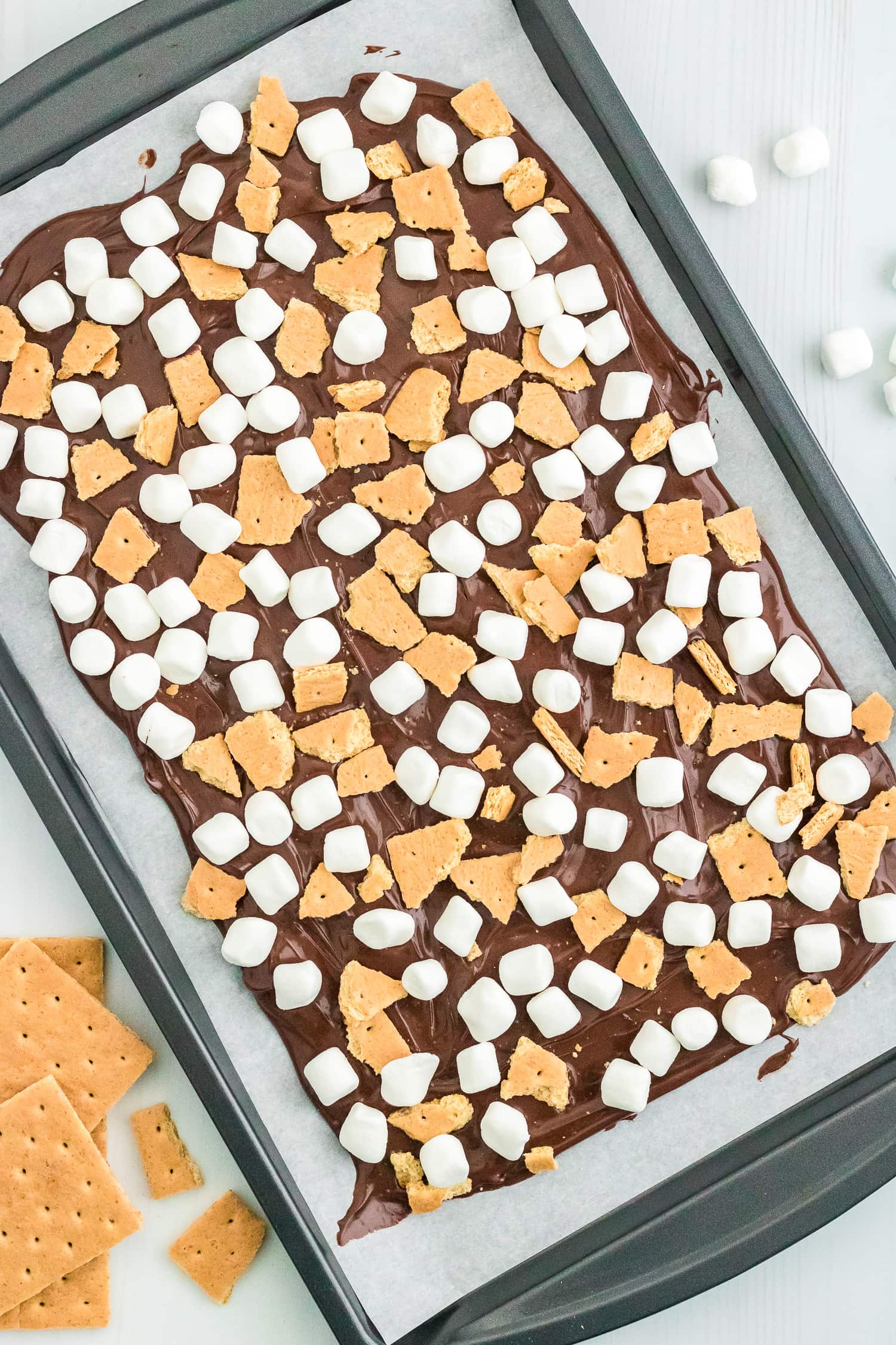 Sheet pan with smores bark on it