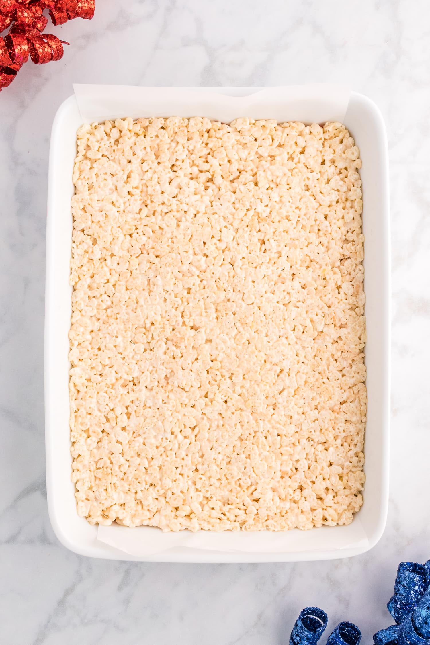 Layer of rice krispies in pan