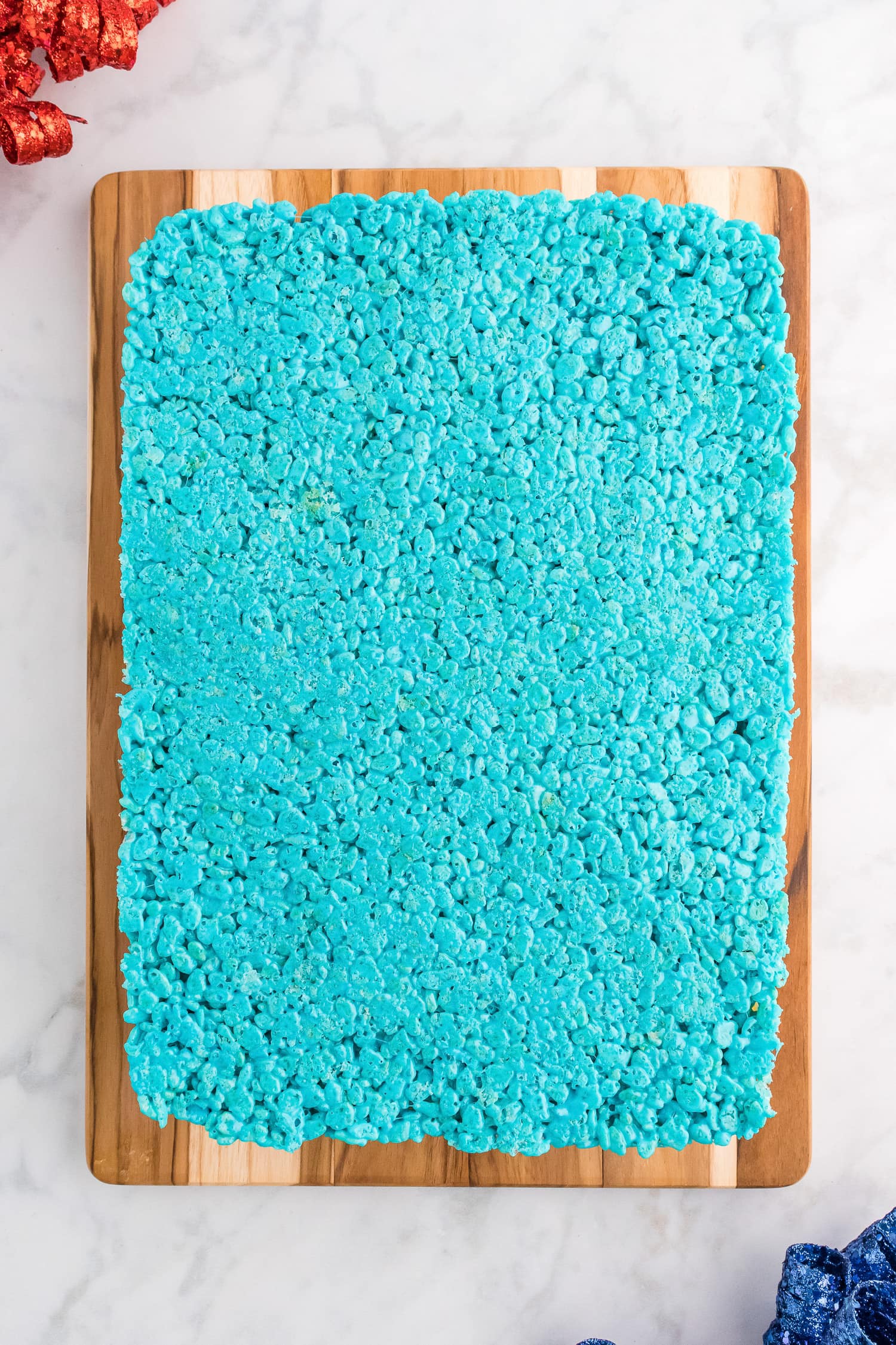 Red White and Blue Rice Krispie Treats on cutting board