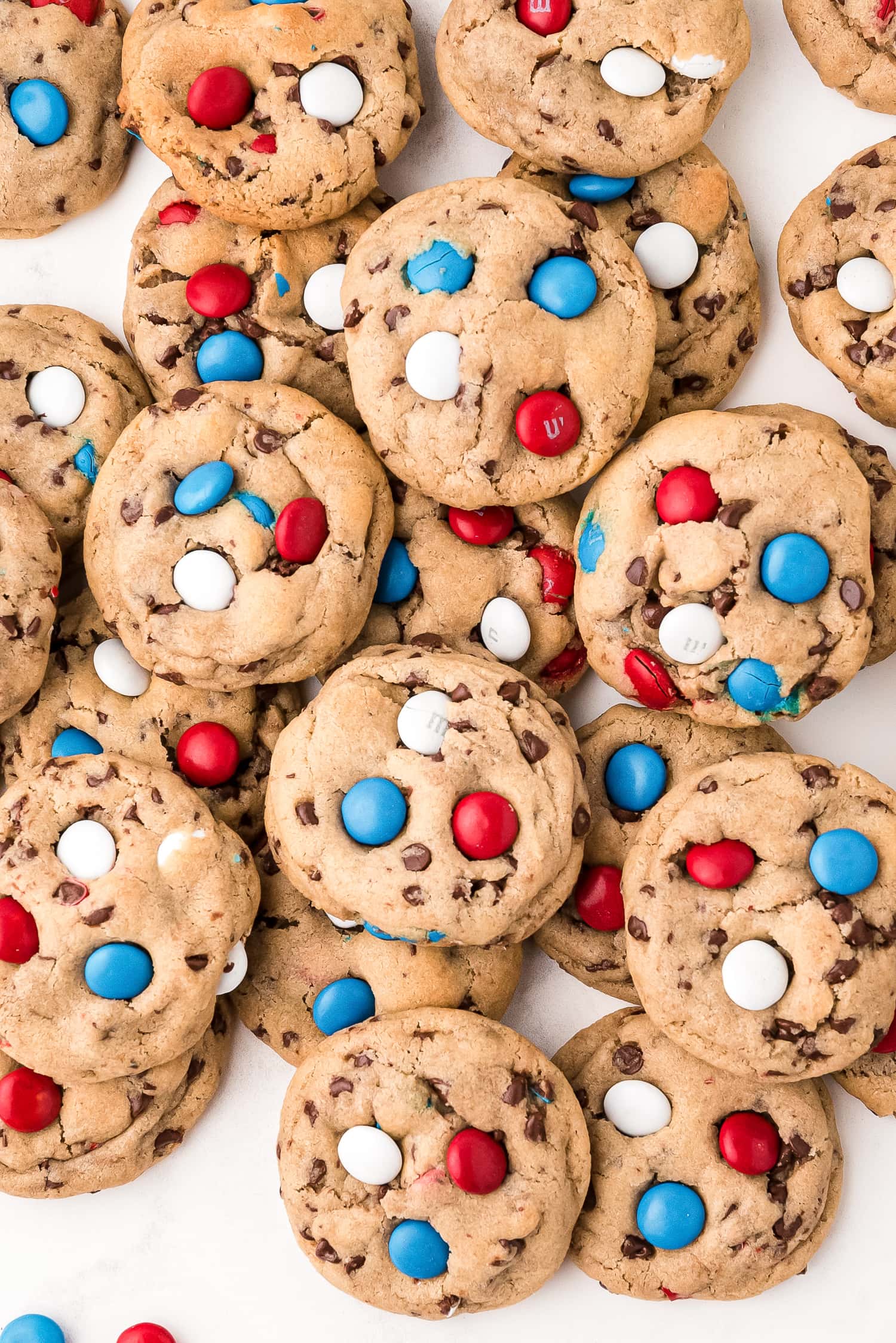 4th of July M&M cookies piled on top of each other