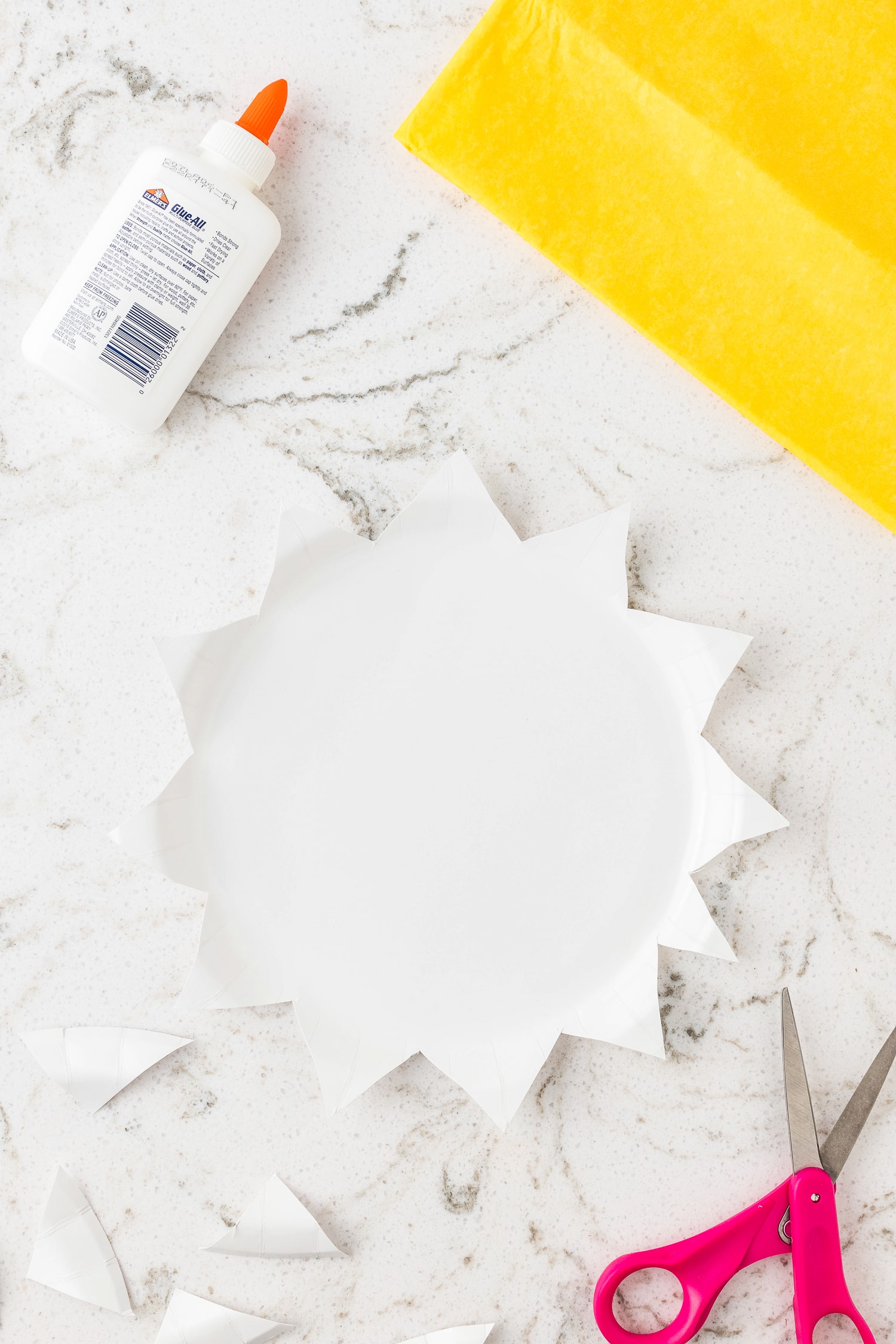 Paper plate cut to look like a sun