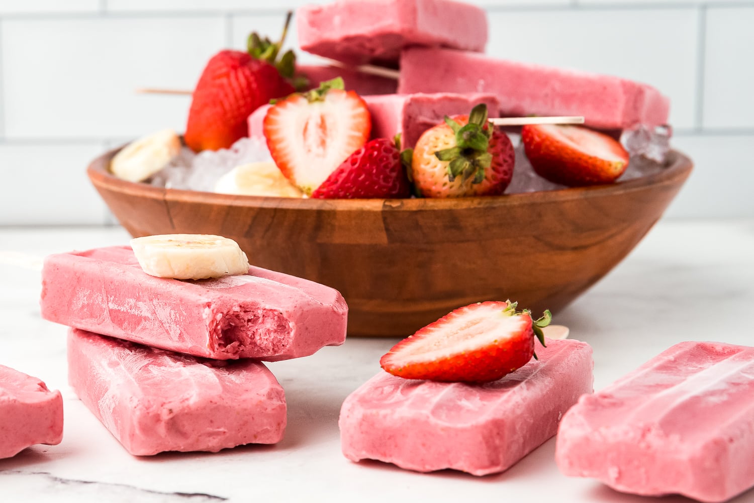 Strawberry Banana Popsicles stacked or in bowl