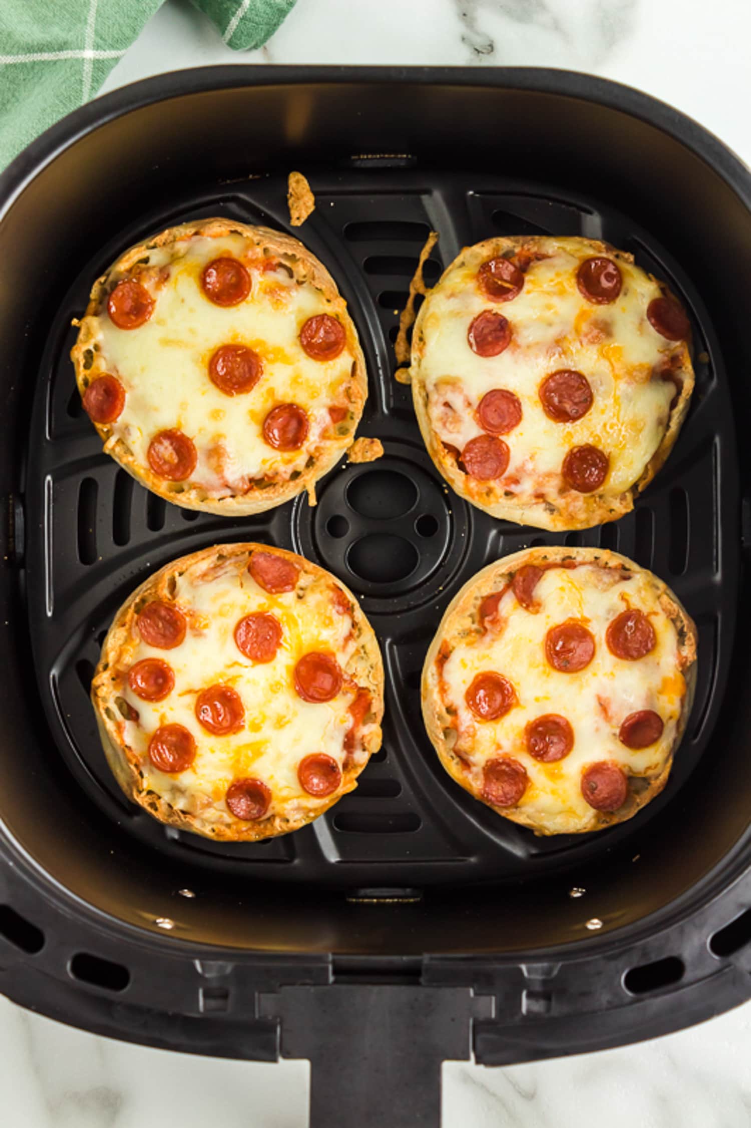 English Muffins Pizzas in Air Fryer Basket
