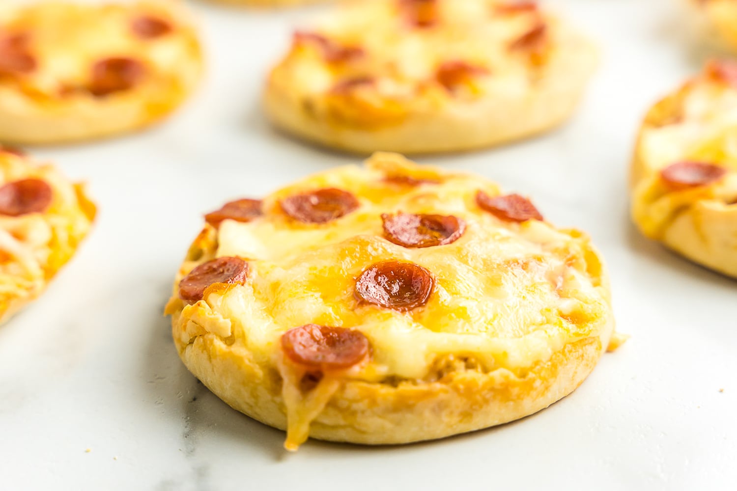 Pepperoni English Muffin Pizza on marble