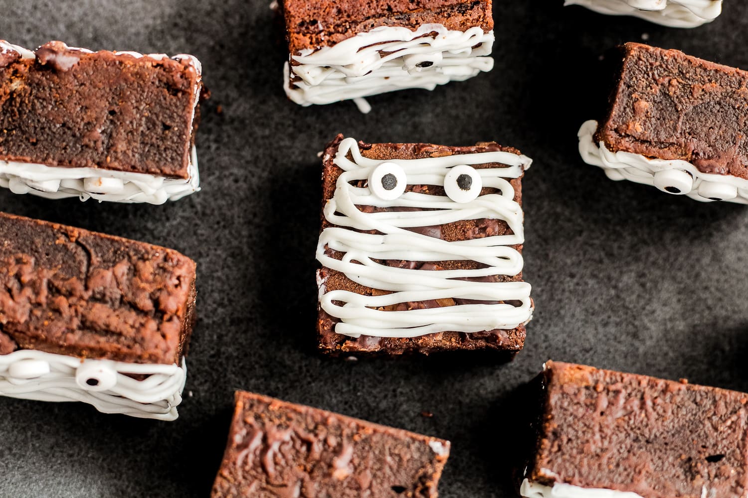 Brownies decorated with vanilla icing and candy eyes