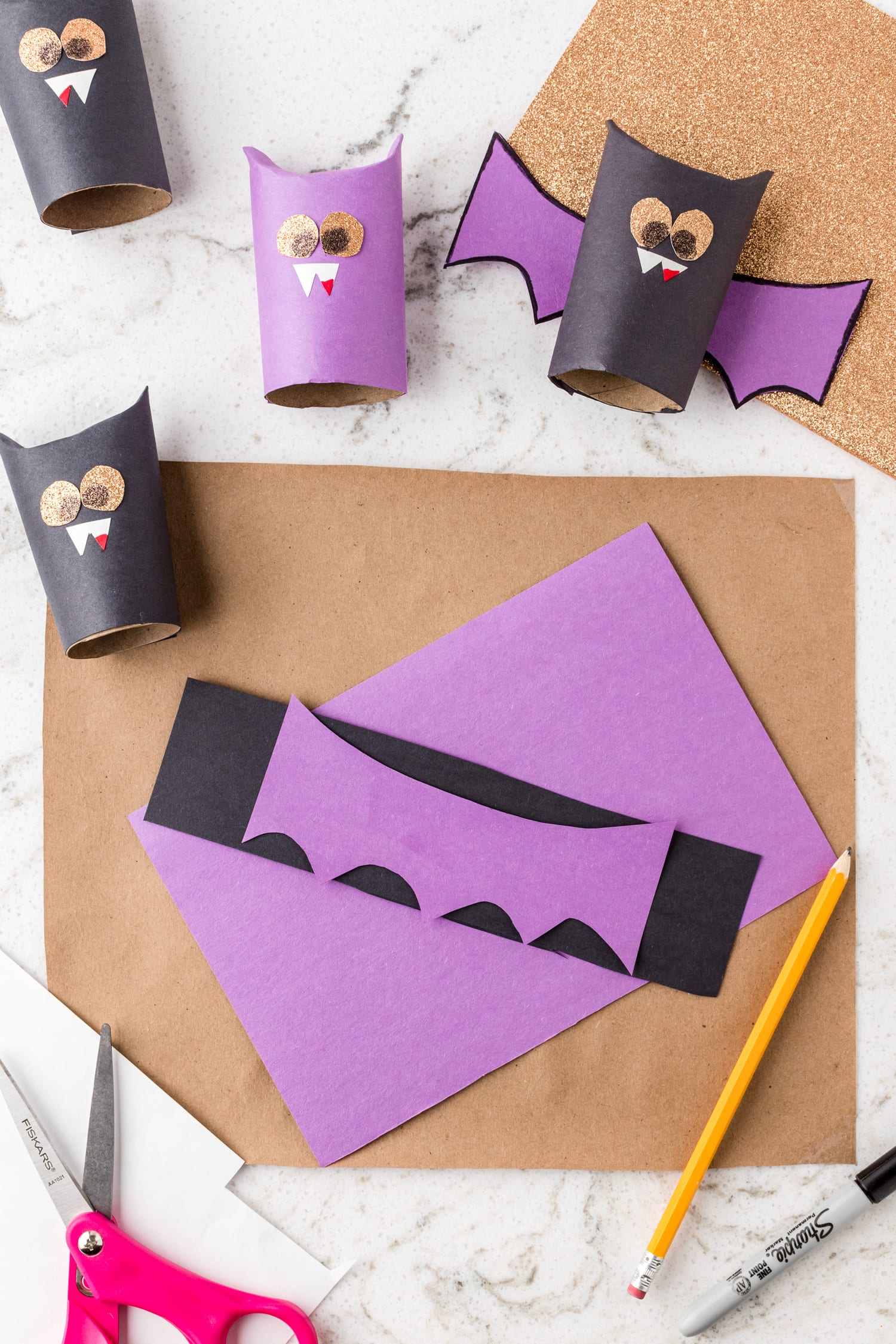 Make bat wings out of construction paper