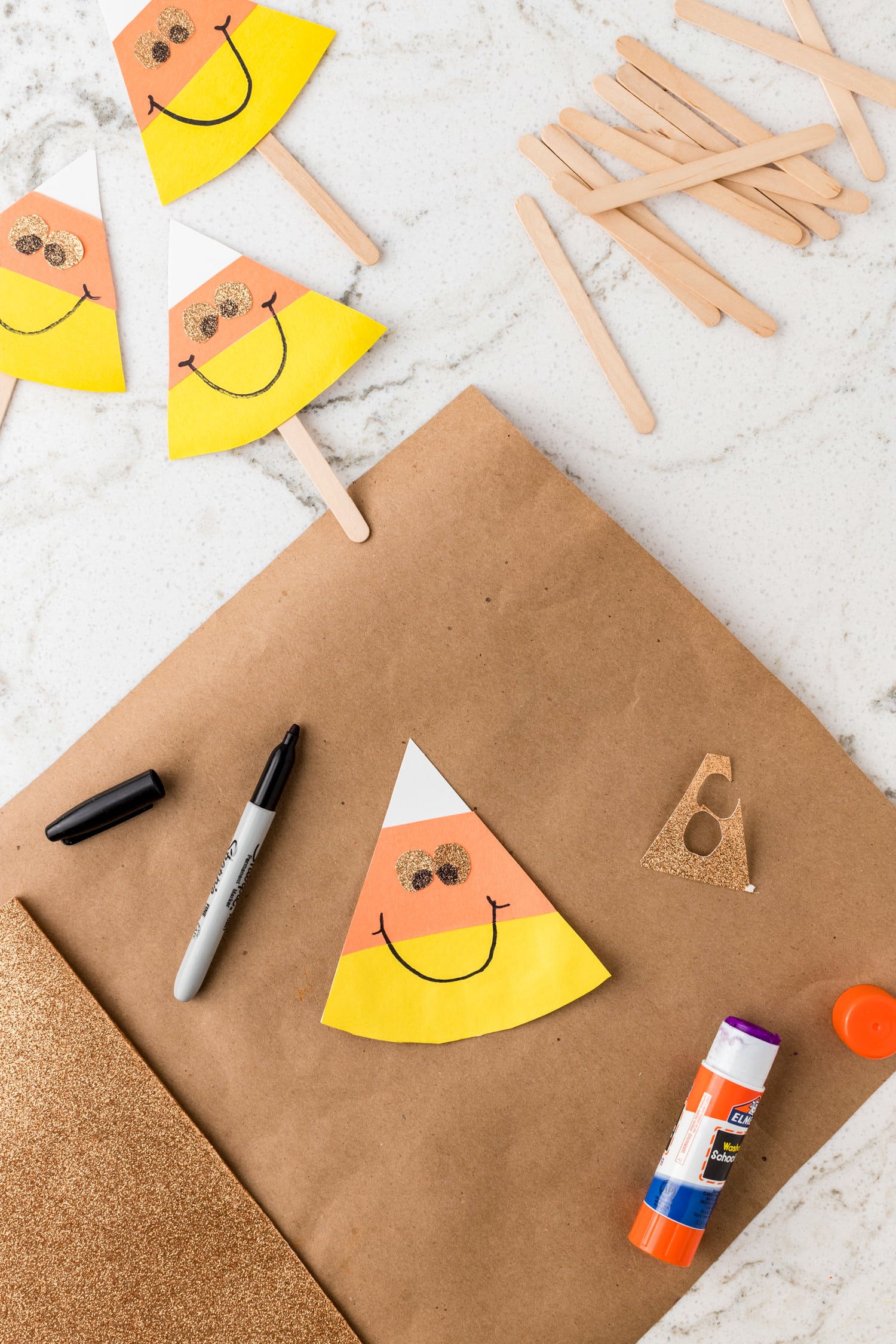 Paper candy corn craft with face