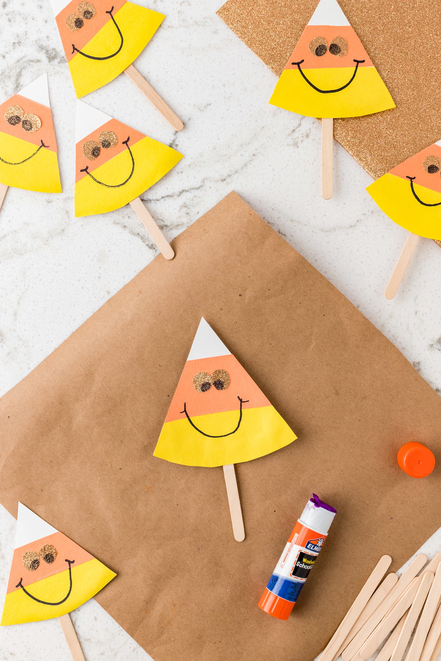 Finished candy corn craft on kraft paper