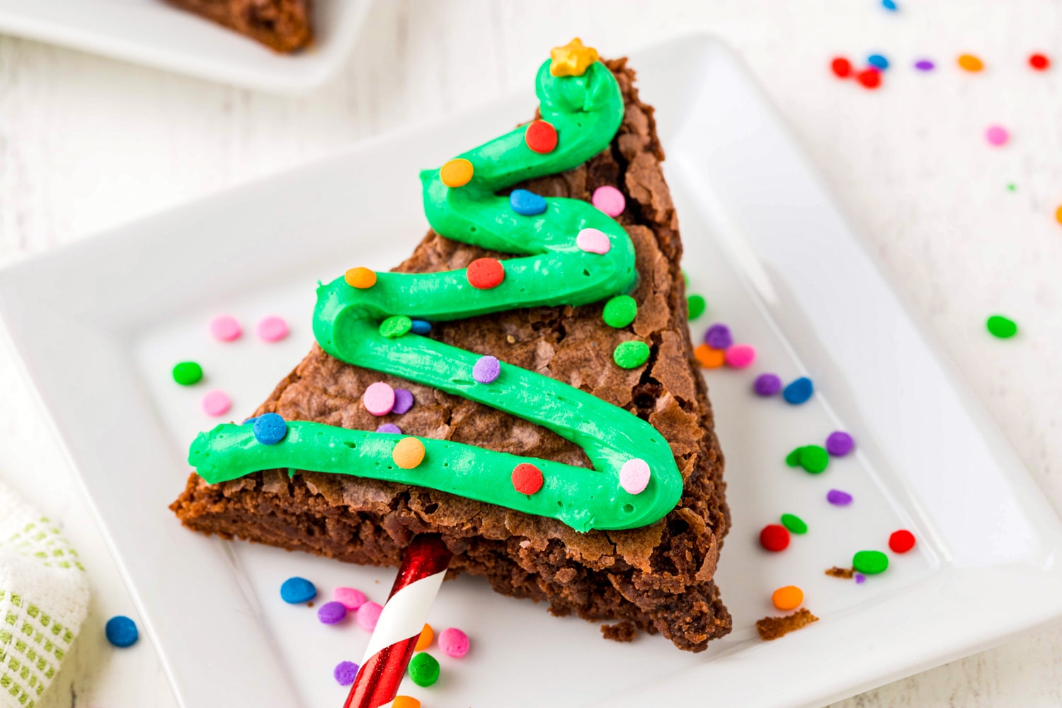 Christmas tree brownie on a white plate