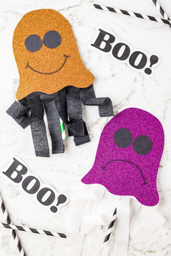 Glittery ghost craft in orange and purple