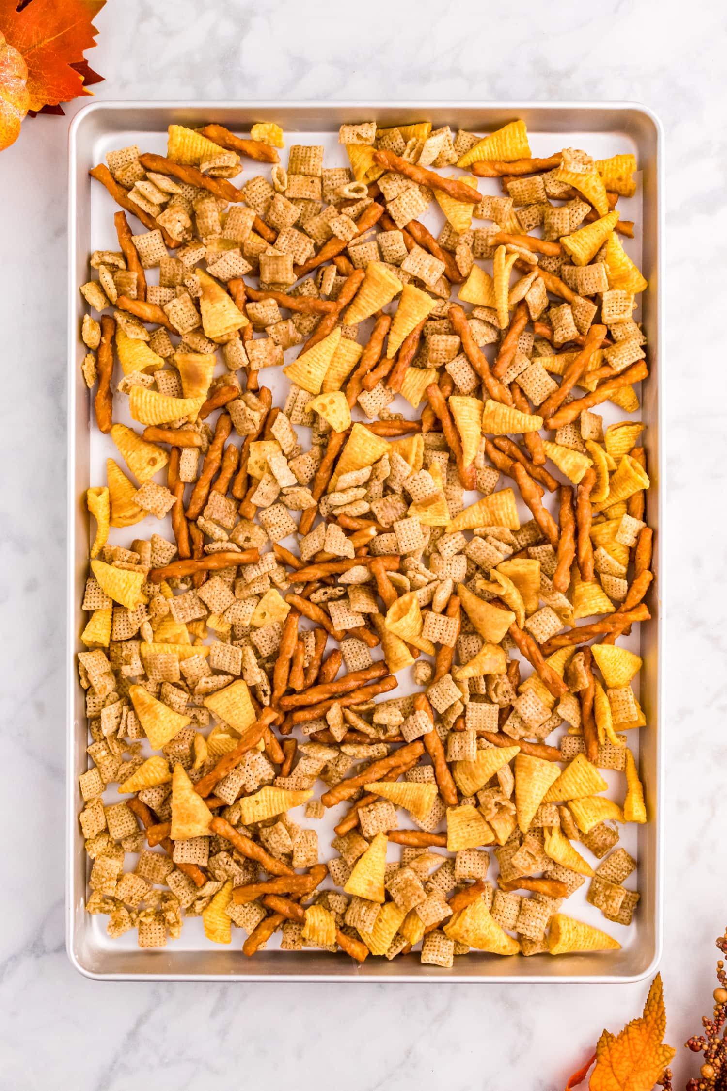 Sheet pan with pretzels, bugles and chex cereal