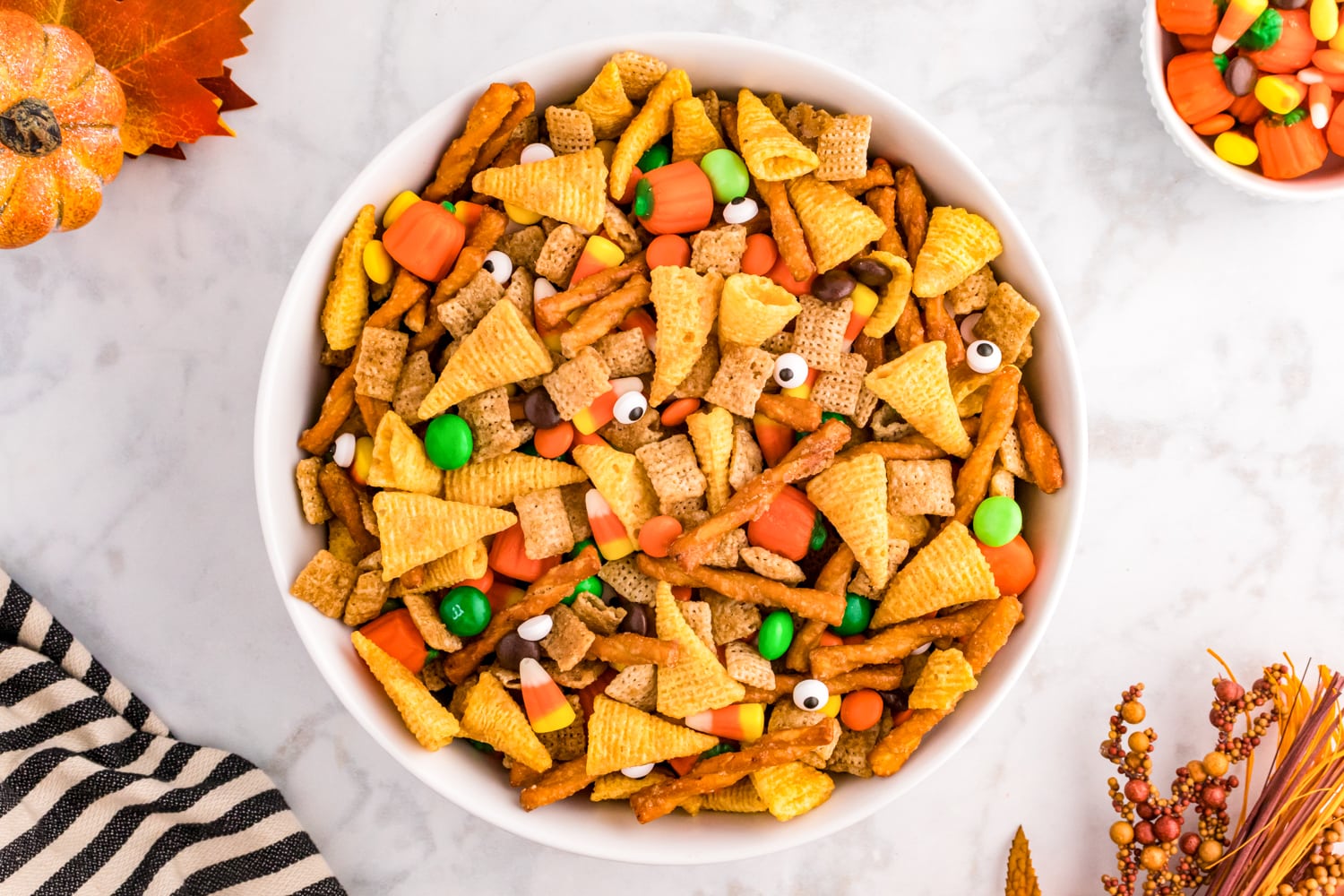 White bowl with Halloween snack mix
