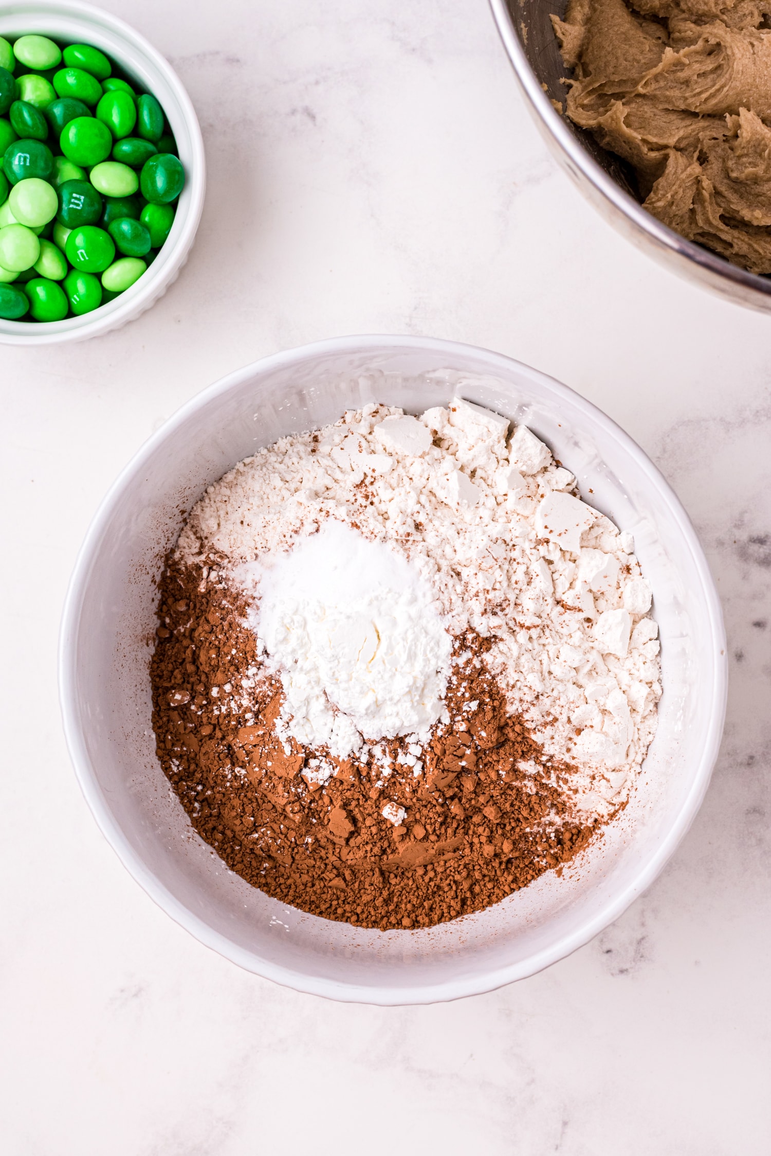 Bowl with flour, cocoa powder, cornstarch, baking soda, and salt.