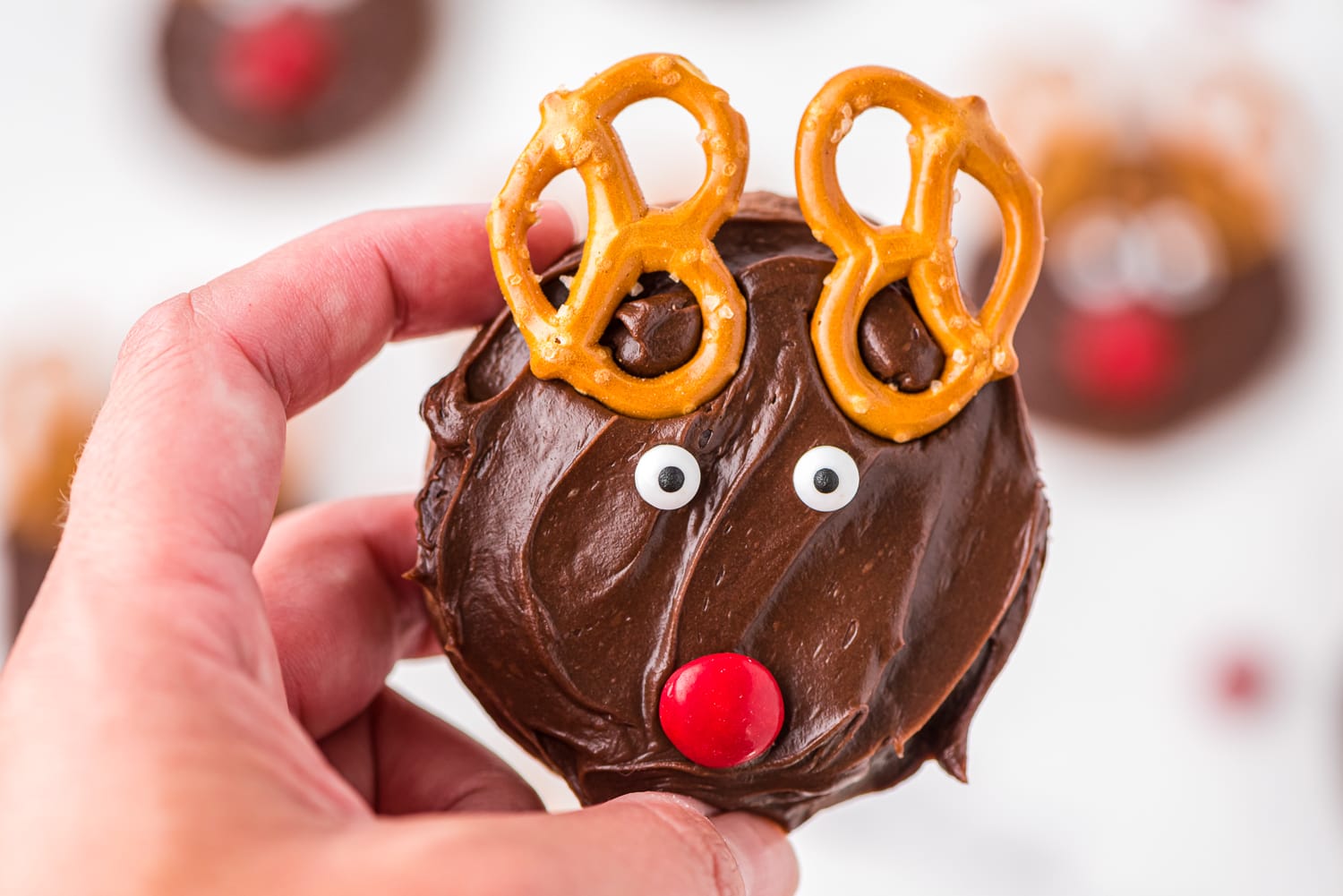 Hand holding Brownie Mix Reindeer Cookies