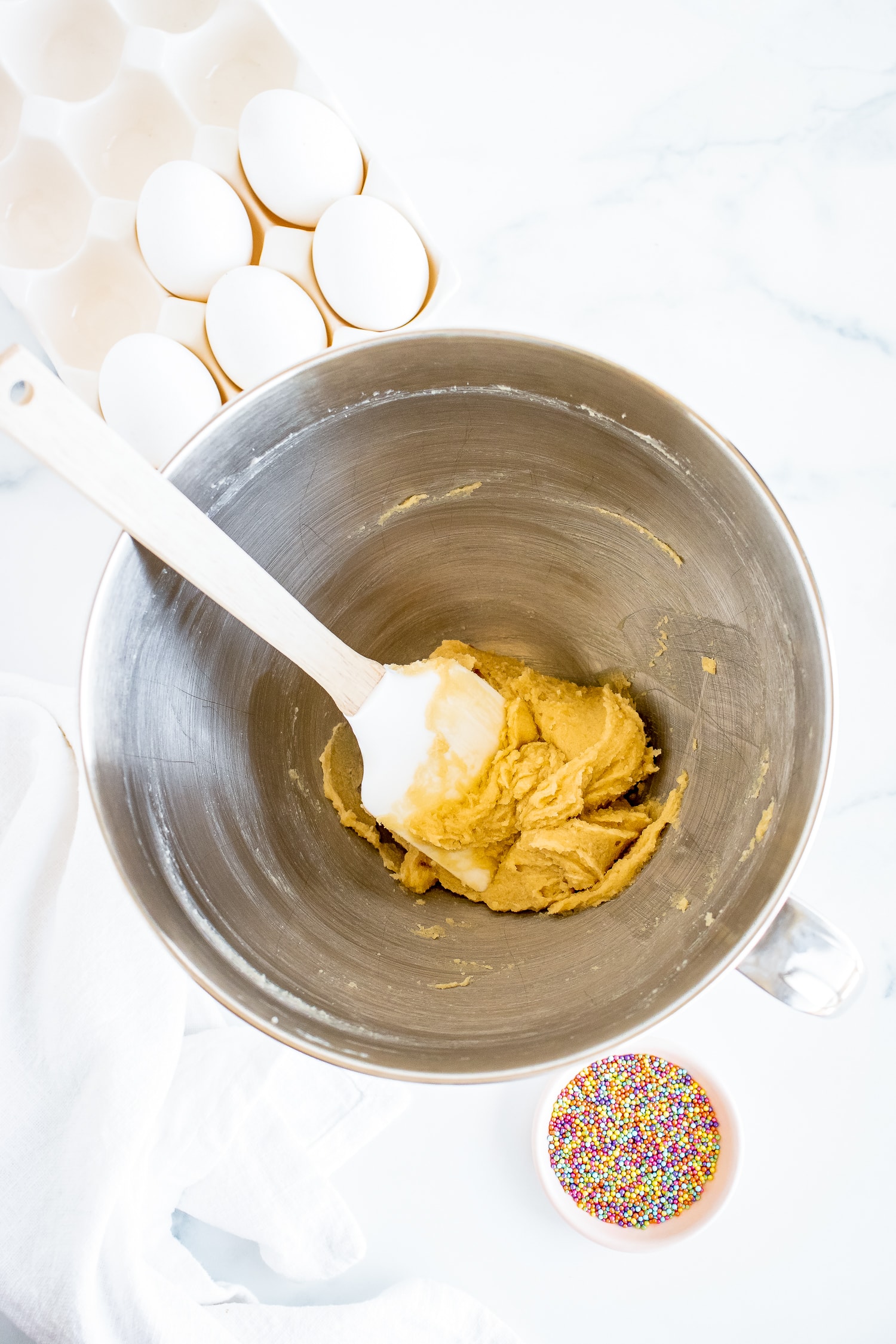 Sugars and stick of butter creamed together mixing bowl