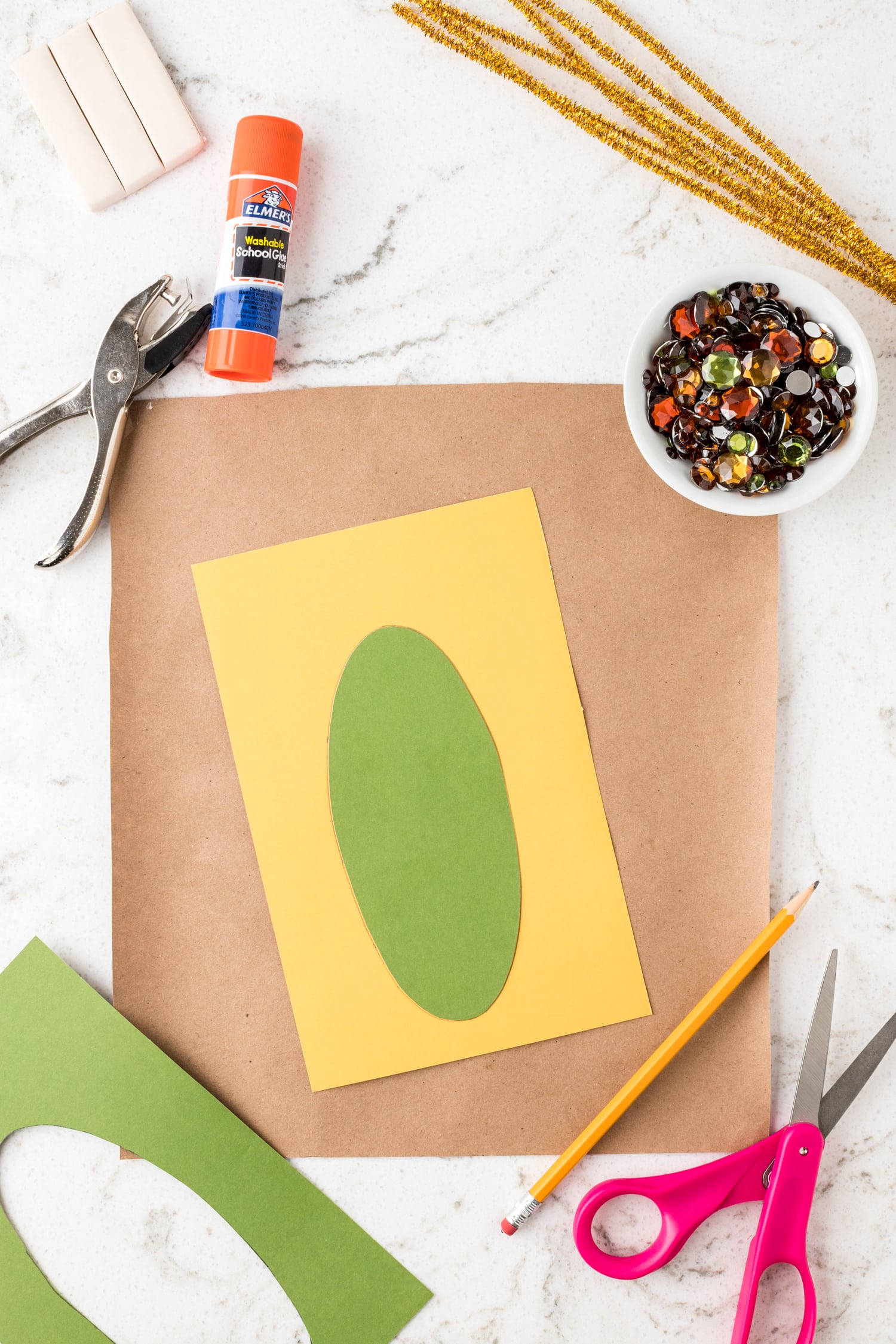 Green oval on yellow paper