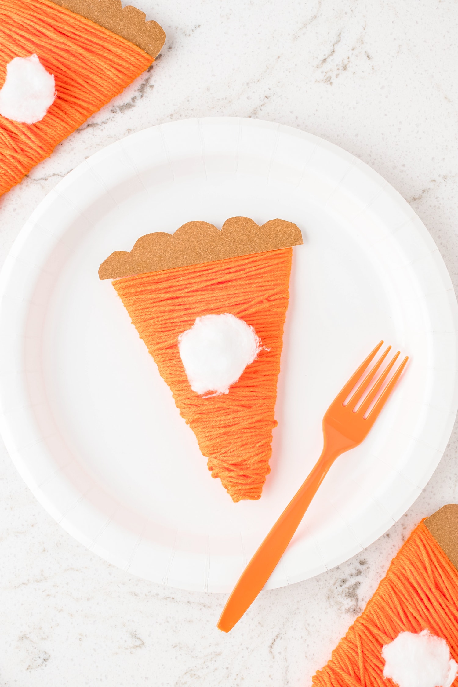 Pumpkin pie craft on white paper plate