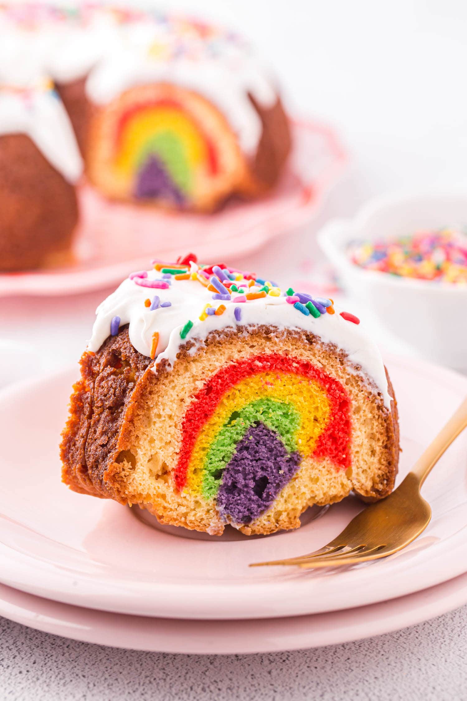 a Piece of the bundt cake displayed on a plate with a fork